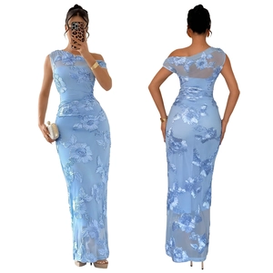 Detail of light blue mesh dress with 3D floral embroidery and one shoulder design