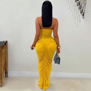 Detail of the back ruched design on this bodycon bright yellow maxi tube dress