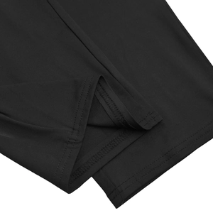 Detail shot of the precise double-needle stitching on black knitted fabric hem