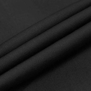 Close-up of premium black ribbed knit fabric with soft silk texture and elasticity