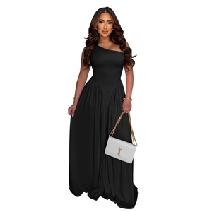 Detail of elegant black one-shoulder maxi dress with ruched bodice and flowing skirt