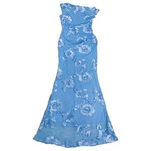 Detail of light blue mesh dress with intricate 3D floral embroidery and sheer hemline