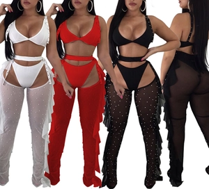 Front and back views of sexy three-piece mesh set with pearls and ruffled trim details