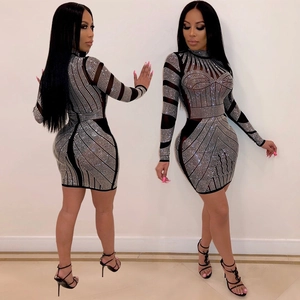 Elegant black long sleeve mini dress with silver rhinestones and sheer mesh patchwork