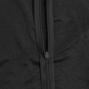 Macro shot of the durable black nylon zipper and fine fabric texture on this stylish jumpsuit