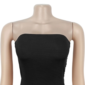 Detail of black strapless tube dress showing fitted knit fabric and neckline cut