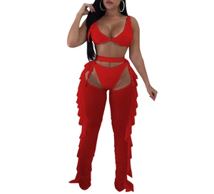 Detail view of red three-piece set featuring mesh ruffles and pearl bead embellishments