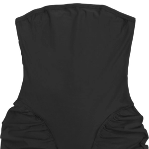 Detail of black strapless mini dress featuring side ruched seams and textured elastic fabric