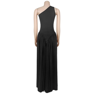 Detail view of the black one-shoulder dress showing the gathered pleats and back silhouette