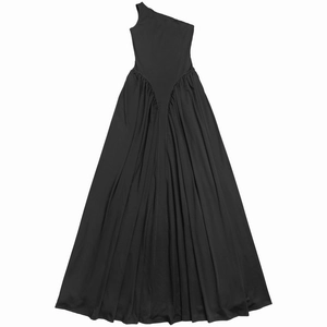 Detail of elegant black one-shoulder evening gown with pleated waist and floor-length hem