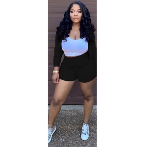 Detailed view of women's three-piece casual set with hoodie, crop top and shorts