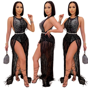 Women's black evening set featuring rhinestone halter top and high-slit fringe maxi skirt
