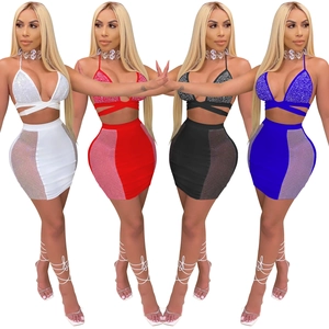 Detail showing two-piece set with rhinestone crop top and side mesh skirt in four colors