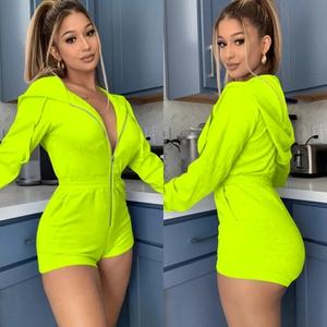 Detailed front view of a neon yellow hooded romper with front zipper and long sleeves