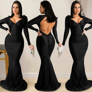 Detail of elegant black deep V-neck long sleeve backless mermaid evening gown