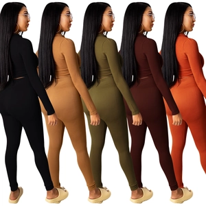 Dames 2-delige gebreide set met lange mouwen crop top en legging met hoge taille in ribgebreid
