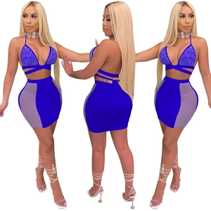 Detailed view of royal blue two-piece set featuring sparkling rhinestones and mesh inserts
