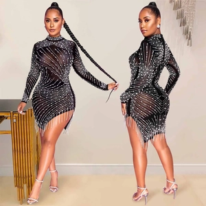 Sexy black sheer mesh bodycon dress with sparkling rhinestones and silver tassels