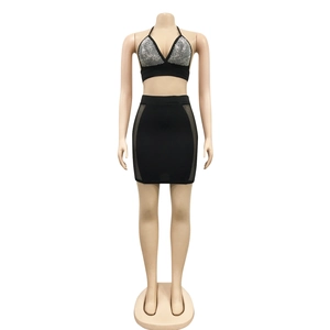 Detail of sexy halter top with silver rhinestones and mesh patchwork mini skirt set