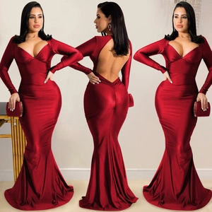 Detail of dark red v-neck backless mermaid dress with long sleeves and satin finish