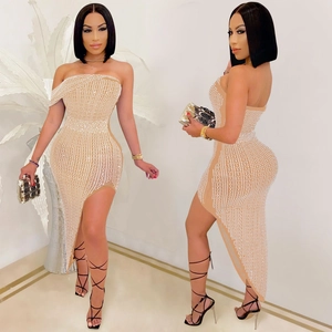 Elegant nude bodycon dress with white rhinestones and asymmetrical shoulder cut