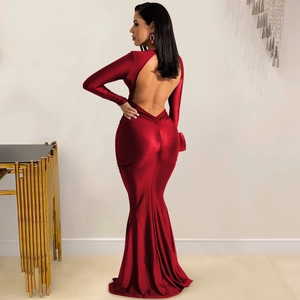 Detail of dark red backless evening dress with gathered waist and mermaid silhouette