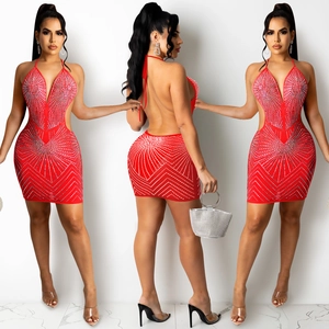 Detailed views of red rhinestone mini dress with waist cut-outs and halter neckline