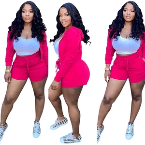 Detailed view of women's 3-piece solid color leisure set with zip hoodie and shorts