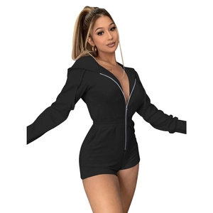 Detail view of women's black hooded romper featuring a zip-up front and slim fit waist