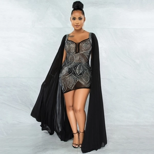 Detailed view of black rhinestone mini dress with elegant long sheer mesh cape sleeves