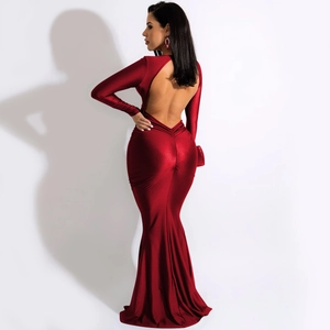 Detail view of red V-neck backless dress in silky satin with ruched fishtail hem
