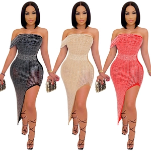 Detailed close-up of slimming rhinestones on strapless evening dresses in multiple colors