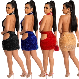 Detail of sequin halter mini dresses showing cut-out waist in black, blue, red, and gold