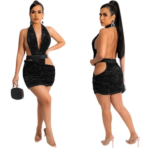 Detail of black sequined halter dress featuring a deep V-neck and waist cut-out