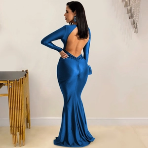 Back view of a royal blue backless evening gown with ruched fishtail detail and long sleeves