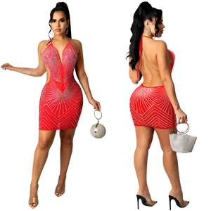 Close-up of red sequin bodycon dress with plunging V-neck and halter open-back design