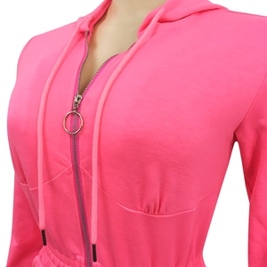 Detail of bright pink hooded jumpsuit featuring front zipper with a metal ring puller