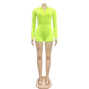 Detail view of neon green long sleeve hooded romper with front zipper and elastic waist