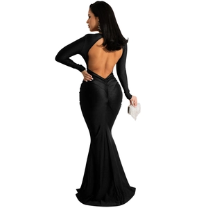 Detail of elegant black deep V-neck backless evening gown with a sleek mermaid silhouette
