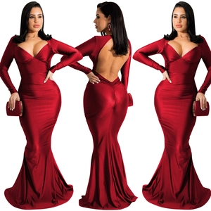 Detail view of red V-neck long sleeve backless maxi dress with sleek fishtail silhouette