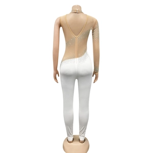 Detailed view of rhinestone embellishments on mesh one-shoulder bodysuit and back zipper