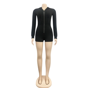 Detailed front view of black long sleeve hooded romper with silver zipper on a mannequin