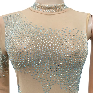 Macro view of nude mesh bodysuit featuring sparkling rhinestones and a high neck design