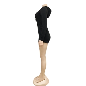 Side view of a slim-fit black hooded bodysuit for women with long sleeves and elastic fabric