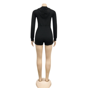 Rear view of black hooded romper jumpsuit with long sleeves and drawstring details