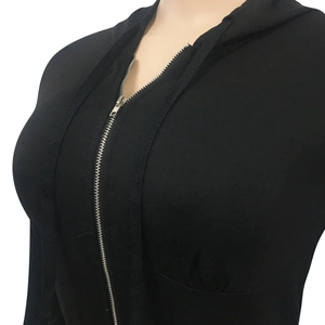 Close-up of black hooded jumpsuit featuring silver metal zipper and flat drawstring