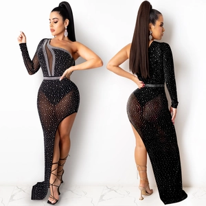 Detail of sexy one-shoulder mesh dress with sparkling rhinestones and high slit design