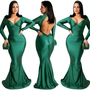 Detail view of deep green V-neck backless evening gown with mermaid silhouette