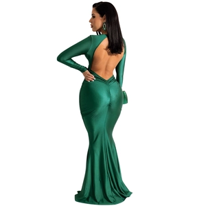 Detail view showing backless design and emerald satin fabric of the long evening dress