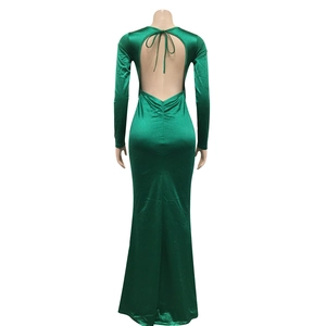 Detail of emerald green backless satin maxi dress with elegant tie-back neck detail